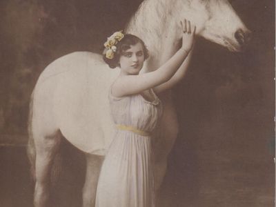 Vintage postcard: A girl with a horse, UK, 1913